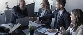 A project manager having a discussion with team 