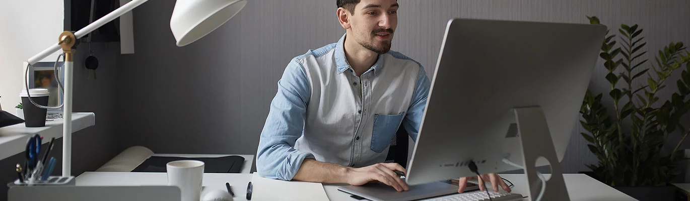 Picture of a Networking Student with laptop