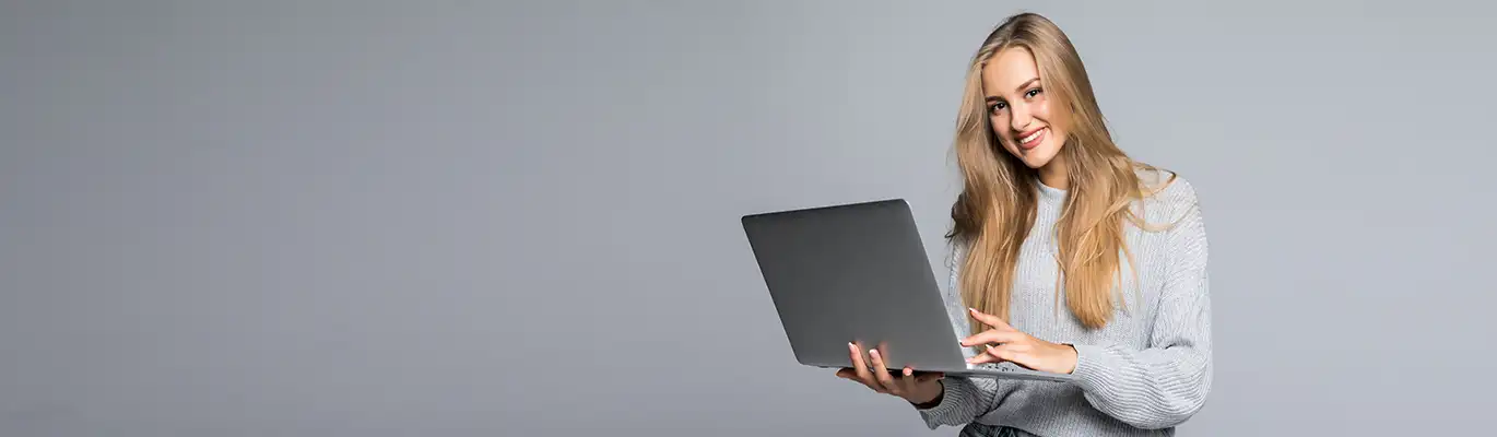 AlterYX professional holding laptop on hand