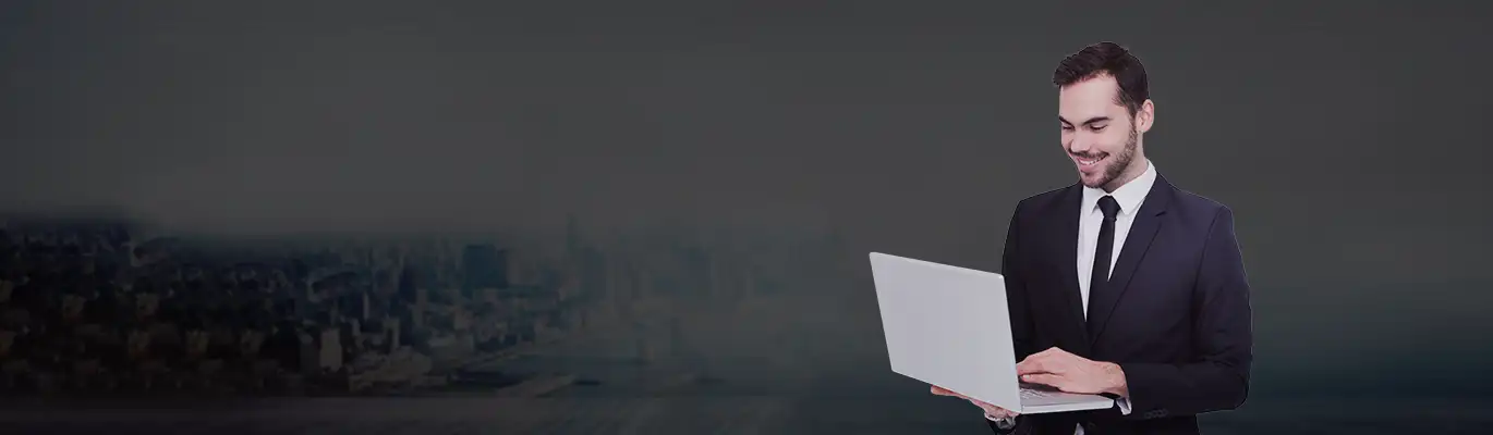 A CCIE Professional using a laptop 