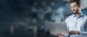 Man using a laptop with a digital world map and network icons in the background.
