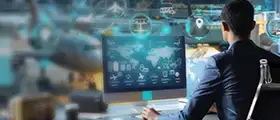A professional analyzes global aviation data on a desktop screen, surrounded by digital icons representing AI, logistics, and risk prediction, with an airport visible in the background.