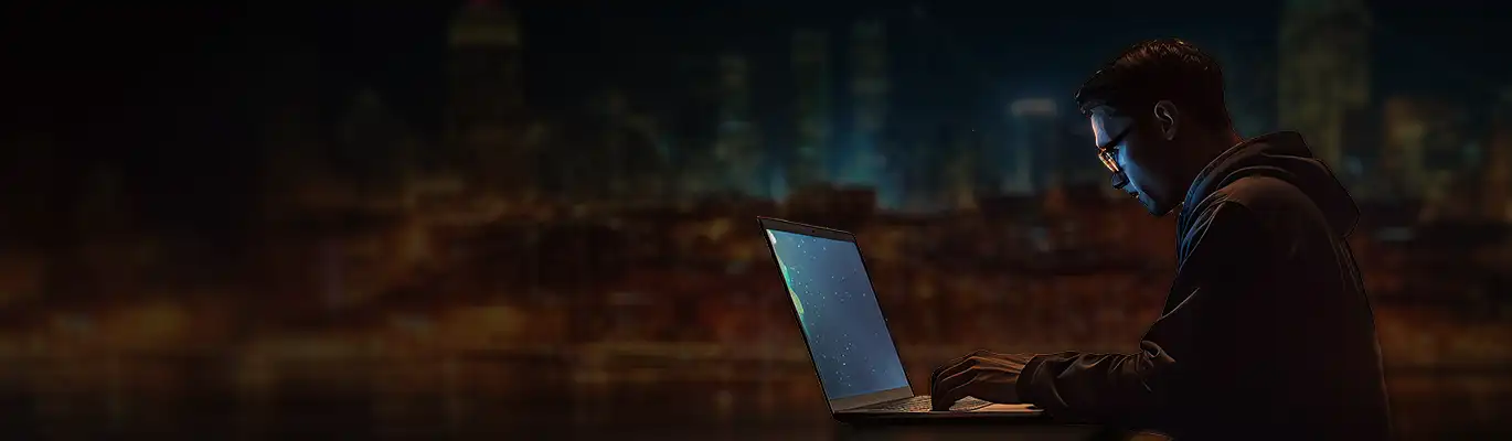 A Full Stack Developer working on a laptop