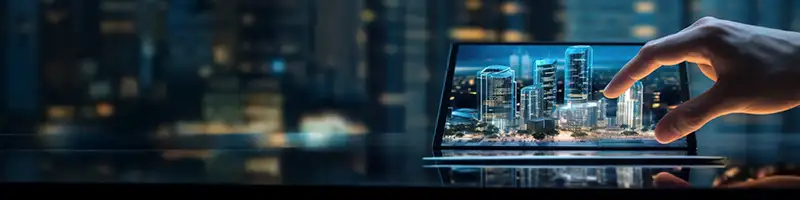 A professional BIM visualization showing a digital smart city skyline on a tablet screen, representing Building Information Modeling, construction planning, and advanced architectural technology.