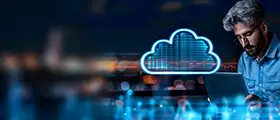 Certified Cloud Security Engineer professional working on laptop with digital cloud security icon.