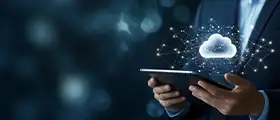 Cloud & App Security professional holding a tablet with a glowing cloud icon and network connections.