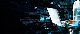 Cybersecurity professional analyzing digital data on a laptop with futuristic blue code interface, representing cyber forensics and incident response technology.