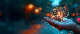 A futuristic illustration of a human hand holding a glowing digital brain with “AI” at its centre, surrounded by light particles, representing generative artificial intelligence and advanced technology.