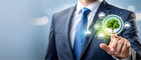 Professional business executive interacting with a digital interface highlighting sustainability, eco-friendly practices, and green growth concepts in a corporate environment.