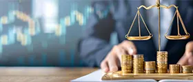 UAE Financial Rules and Regulations course concept with scales of justice and stacked coins representing financial compliance and regulatory governance.