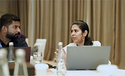Corporate professionals engaged in discussion during Edoxi's Artificial Intelligence (AI) training session presented by Manish at DoubleTree by Hilton, Dubai.