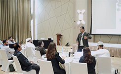 Mentor Manish presenting to corporate professionals during Edoxi's Artificial Intelligence (AI) corporate training at DoubleTree by Hilton, Dubai