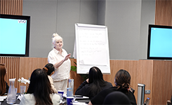 Corporate professionals from Dubai Golf attending Edoxi's Administrative Excellence corporate training led by Julie Archer at the client's premises in Dubai