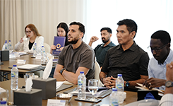 Corporate professionals participating in Edoxi's Assertive Career Excellence training session focused on communication and career development at Al Jaddaf Rotana Hotel, Dubai.