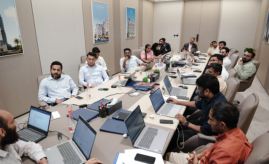 Corporate professionals from VICC attending Edoxi's Generative AI corporate training led by Julie Archer at the client's premises in Dubai